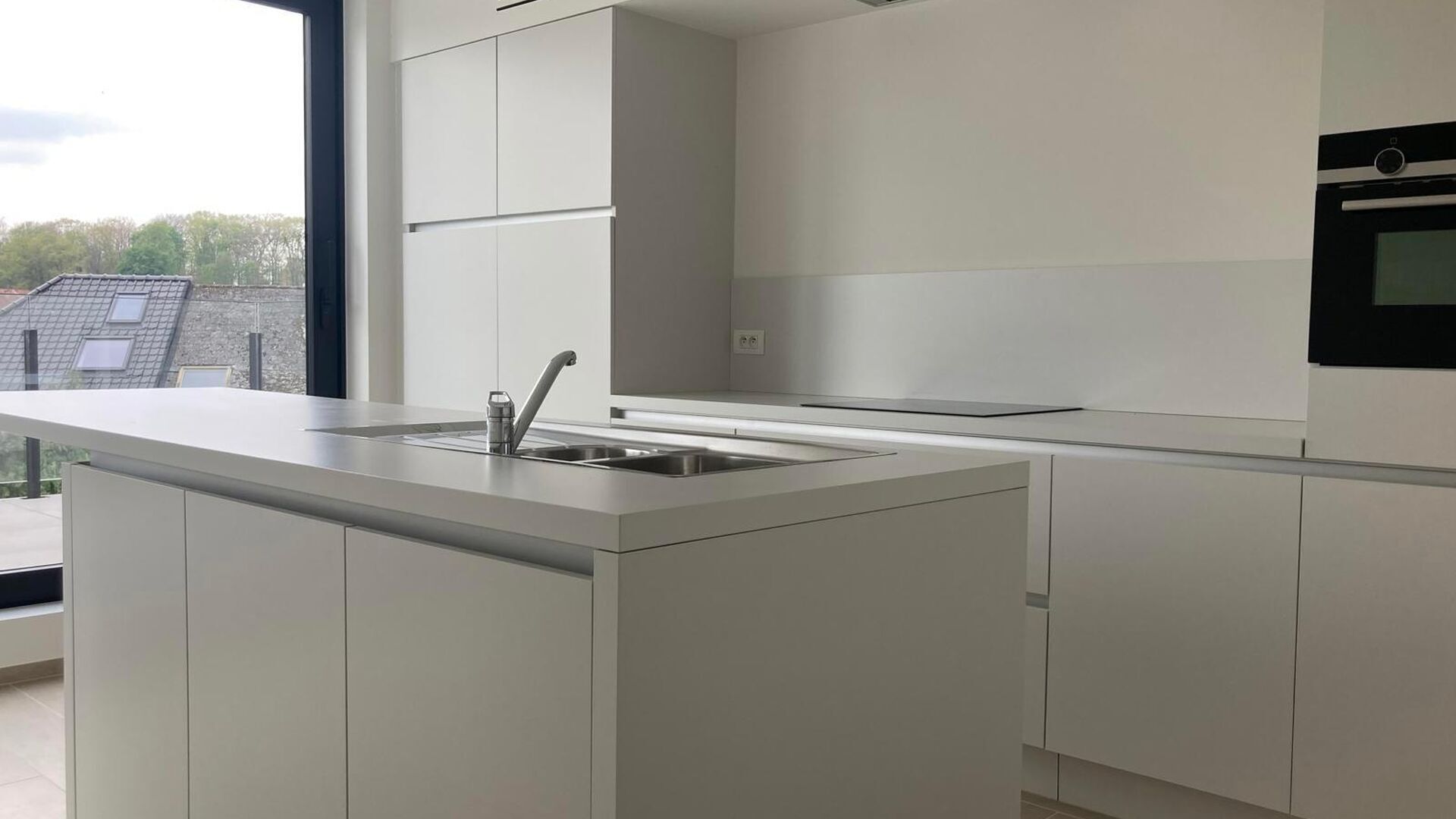 This small-scale luxury residence houses 8 apartments, including this duplex penthouse on the first and second floors. The apartment comprises an entrance hall (elevator goes up to the apartment) on the second floor with separate toilet, open installed ki